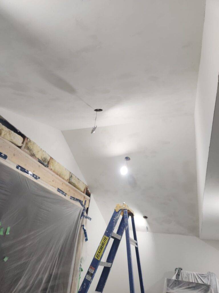 popcorn ceiling removal , plastered and smoothened , sanded and primed